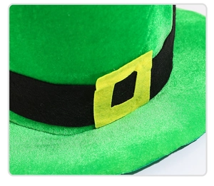 Close-up of green St. Patrick's Day hat featuring felt texture and a yellow buckle detail