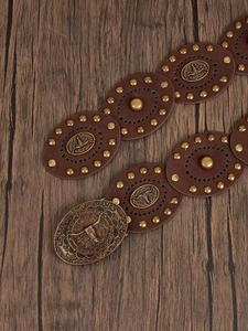 Detailed close-up of Western style brown leather belt with Texas Longhorn bull buckle