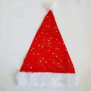 Cappello di Babbo Natale rosso con bordo in peluche bianco e motivi a stelle dorate