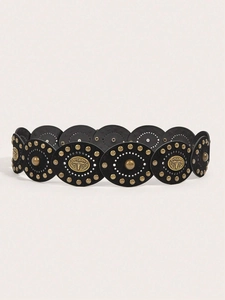 Detail of bohemian black leather belt with golden rivets and vintage horse head metal studs