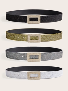 Close-up of sparkling sequin waist belts in black, gold, silver and white colors
