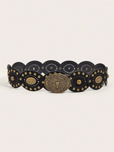 Detail of vintage western belt featuring Texas Longhorn buckle and gold rivet studs