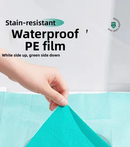 Detail of waterproof PE film disposable toilet seat cover with water droplets showing non-permeability