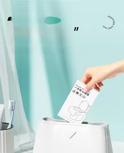 Portable disposable toilet seat cover in compact individual travel size packaging