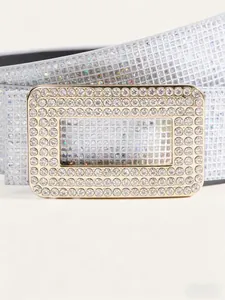 Macro shot of luxury sequin belt with rectangle buckle and shimmering silver rhinestones