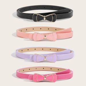 Detail of four girls skinny bow belts in black pink purple and rose red faux leather