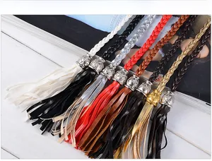 Detail of multi-color woven PU tassels with vintage floral embossed metal connectors
