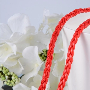 Handmade red braided waist rope for women featuring a stylish tassel belt design