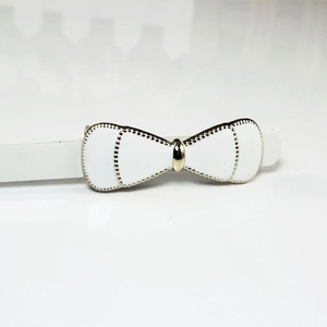 Elegant white bow belt buckle with gold trim for women's dresses and fashion accessories