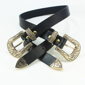 Vintage western black belt with ornate gold floral carved double buckle and metal tip