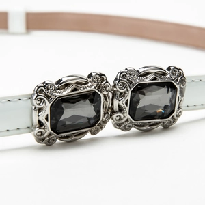 Elegant white skinny leather belt for women with vintage baroque gem-encrusted silver buckle
