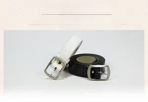 Detail view of black and white women's belts featuring silver rectangular alloy buckles