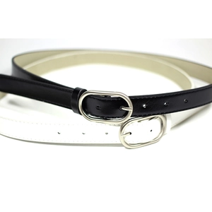 Women's minimalist black and white belt set with silver oval pin buckles for jeans