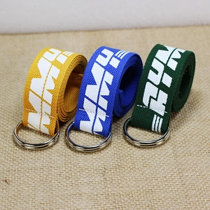 Three nylon woven D-ring belts in yellow, blue and green with white letter patterns