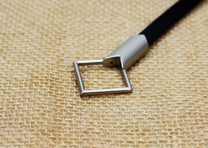 Detail view of high-density nylon strap with a sleek silver matte metal clasp