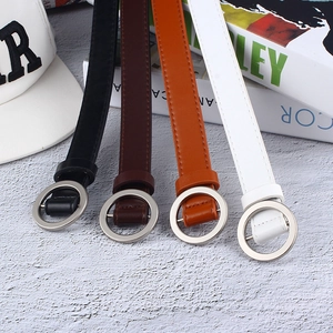 Women's minimalist round buckle skinny faux leather belts in black, brown, and white