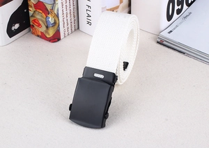 Close-up of white woven nylon belt with black matte metal automatic buckle detail