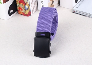 Close-up of purple woven canvas belt featuring a matte black metal automatic buckle