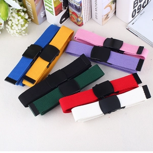 Eight colorful nylon canvas belts with black metal buckles for casual jeans styling