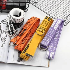Extended canvas belts with D-ring metal buckles in black, orange, yellow, and purple colors