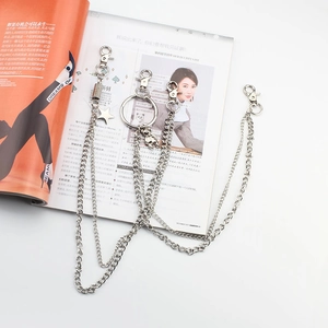 Double-layered silver metal pant chains with star and bear charms in punk style