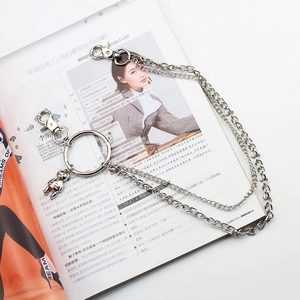 Detail of silver double-layered hip hop pant chain with a cute 3D bear pendant and sturdy hooks
