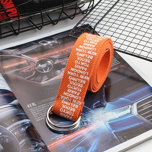 Orange canvas belt with white city names print and silver double D-ring buckle