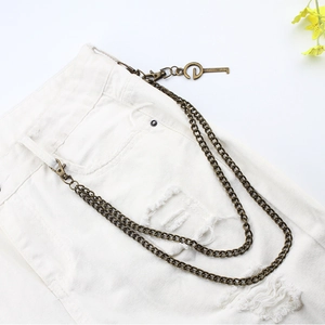 Close-up of double-layer vintage bronze metal hip-hop pants chain with G-letter key pendant