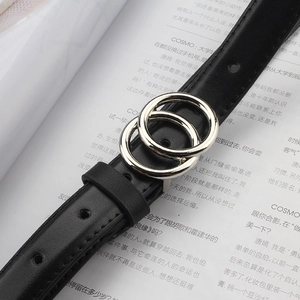 Minimalist black leather belt for women featuring silver double ring buckle in vintage style