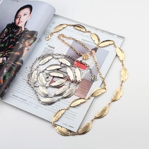 Elegant gold and silver leaf chain belts with delicate feather links for dresses