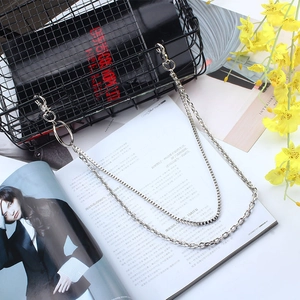 Close-up of double-layered silver metal pants chain with lobster clasps and rings