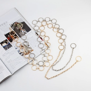 Elegant gold and silver metal chain belts with textured circular rings for dresses