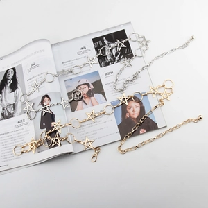 Minimalistische Stern-Taillenkette in Gold und Silber mit verstellbaren Gliedern