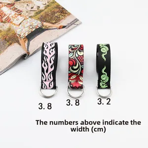 Detailed comparison of 3.2cm and 3.8cm canvas belts with flame and dragon patterns