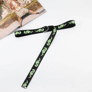 Canvas belt with green dragon print and silver double D-ring buckle for jeans