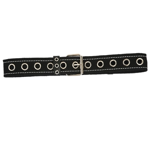Black canvas grommet belt with silver buckle and white contrast stitching for chic style