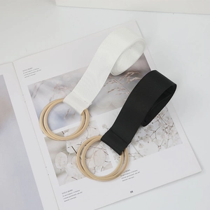 Set of two elastic waist belts in black and white with gold double ring buckles