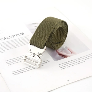 Macro shot of olive green nylon tactical belt with silver metal quick-release buckle