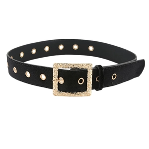 Chic black velvet waist belt with large textured gold square buckle and metal eyelets
