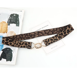 Women's leopard print elastic waist belt with a golden double ring buckle on white background