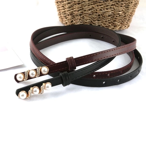 Women's slim waist belts in black and burgundy with elegant pearl and rhinestone buckles