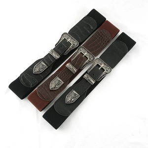 Set di tre cinture elastiche larghe da donna con fibbie retrò intagliate in nero e marrone