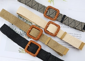 Close-up of bohemian woven belts in four colors with square wooden style buckles