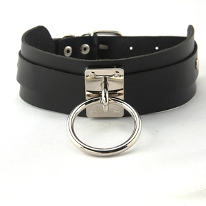 Close-up of black PU leather punk choker with silver metal ring and rivet details
