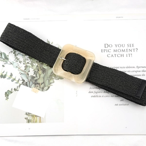 Black woven straw belt for women featuring a vintage resin square buckle and leather tip