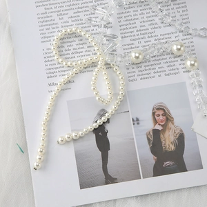 Elegant beaded strap accessory with creamy white pearls and faceted clear crystal beads