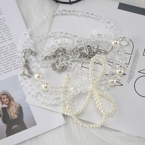 Elegant multilayer crystal and pearl beaded vest chain with a delicate bow knot design