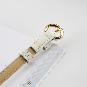 Women's slim white leather belt with a round gold buckle and contrast stitching