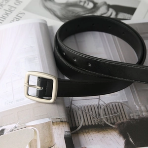 Minimalist black leather belt for men and women with a matte silver square metal buckle