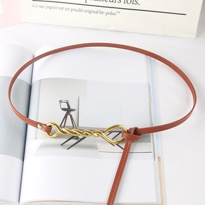Slim brown leather belt with gold twisted metal buckle for dresses and blazers
